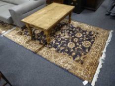 A fringed Ziegler carpet 230 cm x 160 cm on blue ground