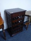 A contemporary sixteen bottle wine rack fitted a drawer