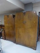 A lady's and gent's walnut wardrobe