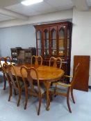 An eight piece dining room suite