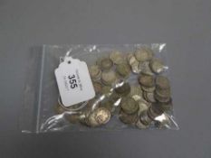 One hundred and twenty-three silver three pence coins