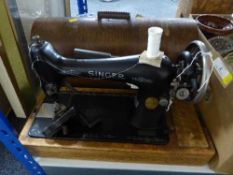 An oak cased Singer sewing machine