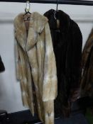 Two 3/4 length fur coats