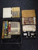 A box containing assorted boxed and unboxed table cutlery,