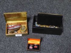 Two boxes of assorted pin badges, cuff links, lighters, whistle,