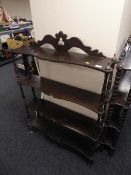 A rosewood four tier what not stand