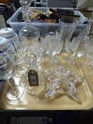 A tray of lead crystal candle holder, bell, decanter and stopper,