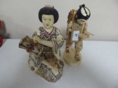 Two large carved figures - Geisha with drum and gentleman reading