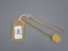 A gold 1911 Sovereign suspended upon a 9ct gold chain with mount, 15.4g gross.