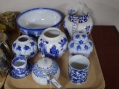 A tray of blue and white china in an oriental style - Burslem jug, assorted ginger jars,
