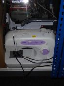 A Brother electric sewing machine and a Bissel vac cleaner