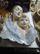 An Italian china relief wall hanging - mother with child,