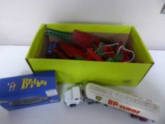 A box containing die cast vehicles, Meccano,