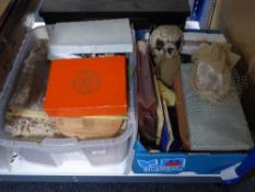 Two boxes containing vintage curtains, leather satchel, vanity case, mid-20th century stuffed panda,
