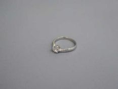 A platinum diamond solitaire ring