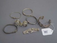 Seven silver bangles and bracelets (7)