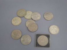 Ten twentieth century Crowns and a five shilling coin