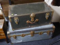 Two vintage metal trunks