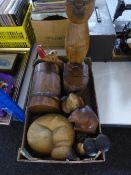 A box of wooden cat ornaments, candle holders,