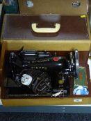 A cased Singer sewing machine