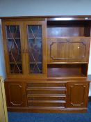 A mahogany cocktail display wall unit