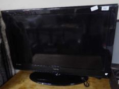 A Technica 32 inch LCD TV and remote