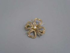 A Victorian diamond set seed pearl four leaf clover brooch, 3.6g.