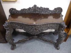 A fine Anglo Indian carved console table.