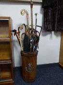 A leather stick stand bearing Durham Light Infantry emblem,