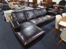 A brown leather corner settee