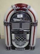 A light-up radio cd juke box