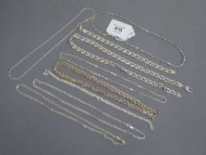 A collection of silver chains and bracelets (Q)