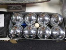 A cased set of Petanque boules