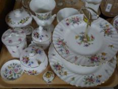 A tray of decorative floral patterned china by Minton,