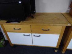 A pine Ikea work bench fitted two drawers and cupboards