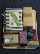 A tray containing a boxed vintage green arrow sweeper, boxed hair clippers, mincer,