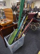 A box of assorted fishing rods inc.