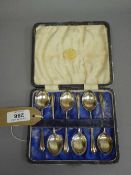 A set of six silver teaspoons, cased.