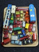 A tray containing a quantity of vintage play-worn die cast vehicles including Corgi,