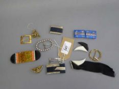 A good collection of Art Deco style buckles, costume jewellery clips etc.