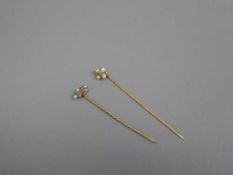 Two antique gold pins set with diamonds and pearls
