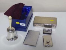 A boxed Dunhill table lighter in the form of a handbell together with a boxed miniature lighter in