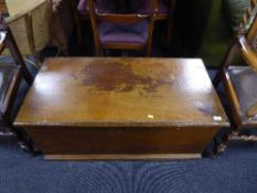 An antique pine blanket box