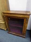 A Victorian inlaid walnut and ormolu mounted display cabinet