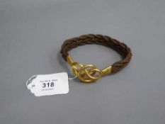 A large hair ornament with 15ct gold clasp