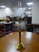 A brass Corinthian column Messenger's oil lamp with chimney and shade,