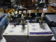 Two metal three way light fittings,