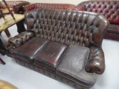 A re-upholstery project - a brown leather three seater Chesterfield (one odd cushion)