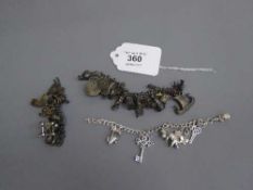 Three silver charm bracelets (3)