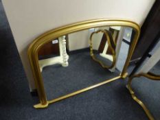 A gilt framed over mantel mirror